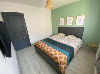 Un ou plusieurs lits dans un hébergement de l'établissement Appartement cosy entre Paris & Normandie