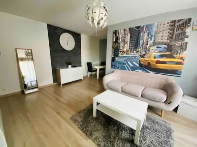 Coin salon dans l'établissement Appartement cosy entre Paris & Normandie