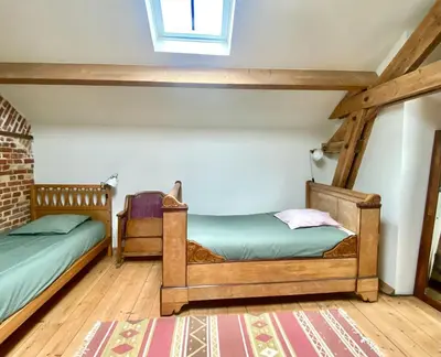 Un ou plusieurs lits dans un hébergement de l'établissement Les Gîtes de Little Castle campagne à 1 h de Paris