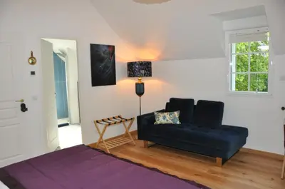 Un ou plusieurs lits dans un hébergement de l'établissement Au coeur de l'Isle Adam - Le Clos de l'Isle