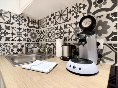 Cuisine ou kitchenette dans l'établissement Elfeuf centre - Chez Maxime
