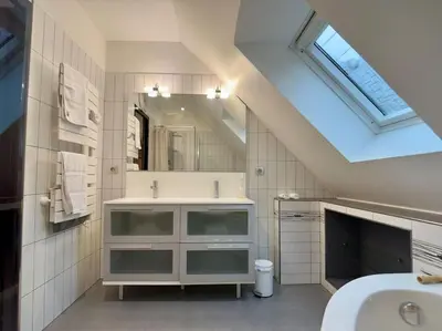Salle de bains dans l'établissement Amfreville la Mivoie - Villa Belle vue - Piscine