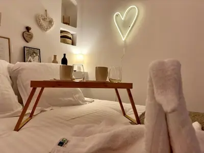 Un ou plusieurs lits dans un hébergement de l'établissement Casa Love