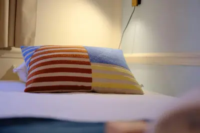 Un ou plusieurs lits dans un hébergement de l'établissement Rouen Hôtel de Ville - Chez Eric