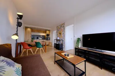 Télévision ou salle de divertissement dans l'établissement Rouen Hypercentre - Seine en vue
