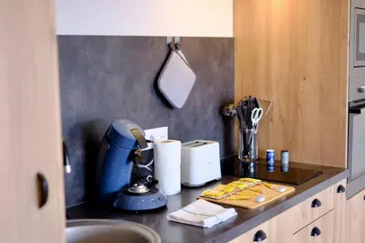 Cuisine ou kitchenette dans l'établissement Rouen Hypercentre - Seine en vue