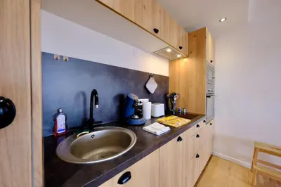 Cuisine ou kitchenette dans l'établissement Rouen Hypercentre - Seine en vue