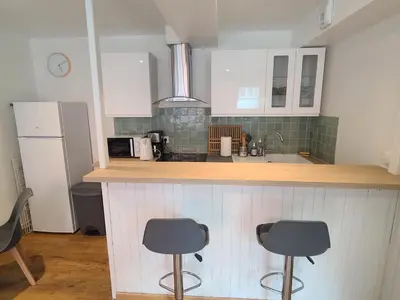 Cuisine ou kitchenette dans l'établissement Le Vert d'Eau - Évasion Authentique au Cœur de Dieppe