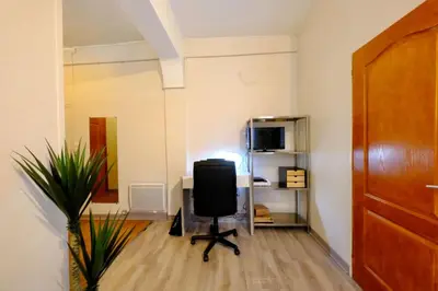 Télévision ou salle de divertissement dans l'établissement Rouen Saint Romain - Chez Solange