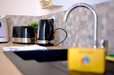 Cuisine ou kitchenette dans l'établissement Rouen - Bienvenue chez Alice