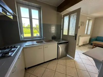 Cuisine ou kitchenette dans l'établissement Maison campagne Normande