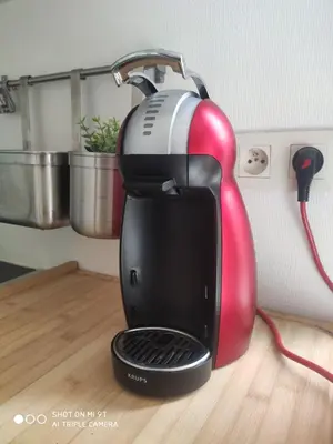 Cuisine ou kitchenette dans l'établissement Chaleureux T2 au style VINTAGE - rue gratuite