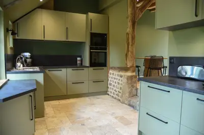 Cuisine ou kitchenette dans l'établissement Le Cottage -Gîte de charme-