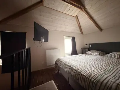 Un ou plusieurs lits dans un hébergement de l'établissement Duplex Calme & Cosy - 2 min Gares & Proche Aéroport