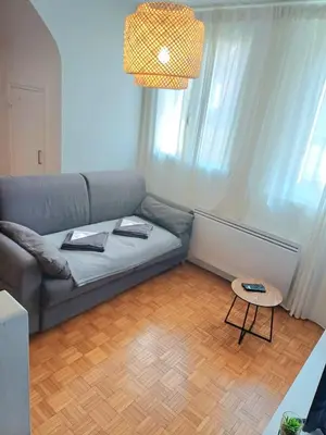 Coin salon dans l'établissement Le Loft - En Plein Centre Très Spacieux
