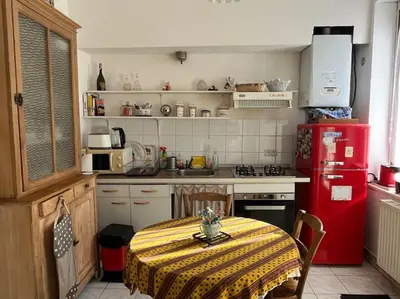 Cuisine ou kitchenette dans l'établissement Les volets bleus à 20 minutes de la Baie de Somme