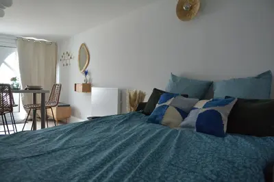Un ou plusieurs lits dans un hébergement de l'établissement Bel appartement neuf proche de Paris