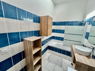 Salle de bains dans l'établissement Le Blue Bay