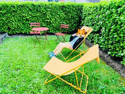 Jardin de l'établissement Appartement standing avec jardin, 4 personnes, stratégiquement situé