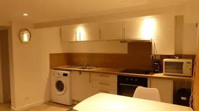 Cuisine ou kitchenette dans l'établissement CosyRouen Jacuzzi Parking gratuit