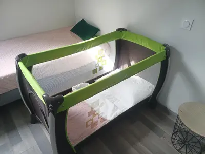 Un ou plusieurs lits dans un hébergement de l'établissement Le gîte Maimbevillois