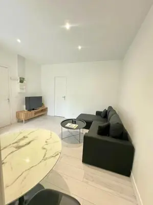 Télévision ou salle de divertissement dans l'établissement Appartement chaleureux 1