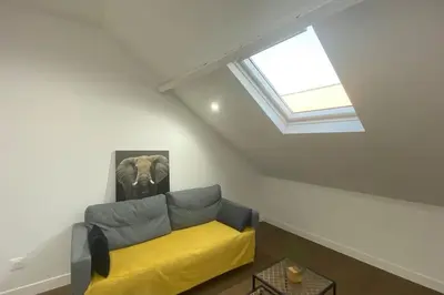 Coin salon dans l'établissement Appartement cosy