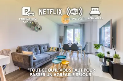 Coin salon dans l'établissement Appartement tout confort - Parking privé gratuit