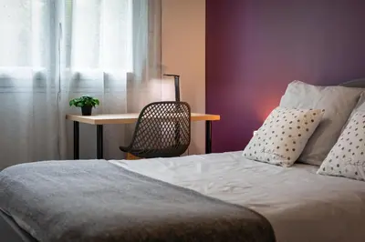Un ou plusieurs lits dans un hébergement de l'établissement Appartement tout confort - Parking privé gratuit