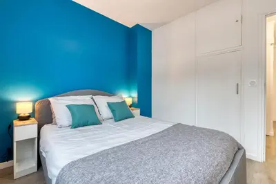 Un ou plusieurs lits dans un hébergement de l'établissement Appartement tout confort - Parking privé gratuit