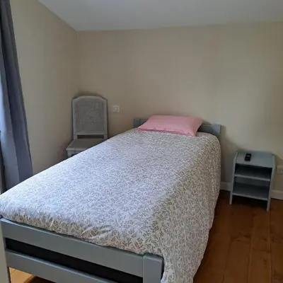 Un ou plusieurs lits dans un hébergement de l'établissement Vue sur village
