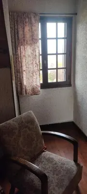 Coin salon dans l'établissement Bed and breakfast