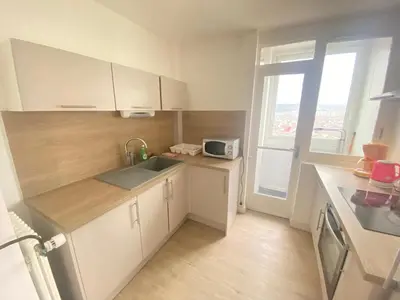 Cuisine ou kitchenette dans l'établissement Au dessus du jardin - 185