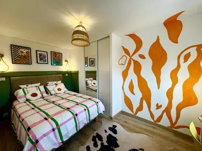 Un ou plusieurs lits dans un hébergement de l'établissement Appartement Pop Art