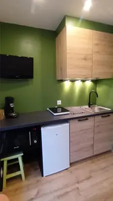 Cuisine ou kitchenette dans l'établissement Cosy cottage