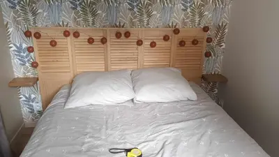 Un ou plusieurs lits dans un hébergement de l'établissement Cosy cottage