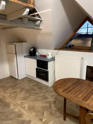 Cuisine ou kitchenette dans l'établissement Gîte les Crayons