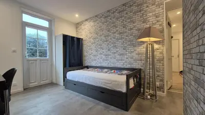 Un ou plusieurs lits dans un hébergement de l'établissement Maison Les Glycines Rouen
