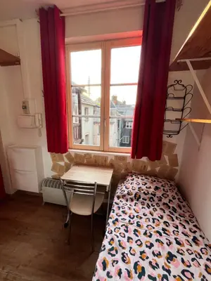 Un ou plusieurs lits dans un hébergement de l'établissement Petit nid ensoleillé