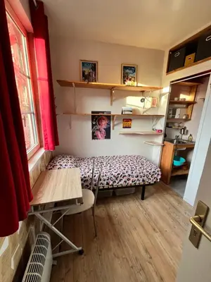 Cuisine ou kitchenette dans l'établissement Petit nid ensoleillé