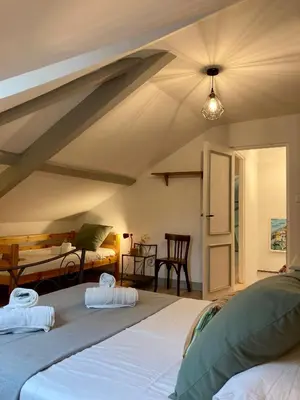 Un ou plusieurs lits dans un hébergement de l'établissement A 2 pas Maison 3 couchages