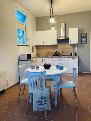 Cuisine ou kitchenette dans l'établissement A 2 pas Maison 3 couchages
