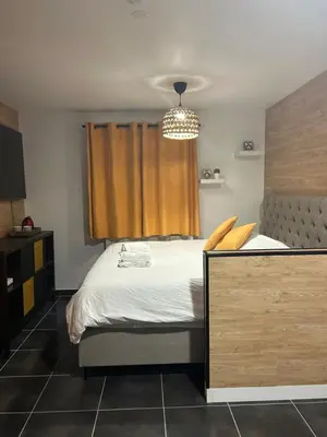 Un ou plusieurs lits dans un hébergement de l'établissement Appartement EVASION
