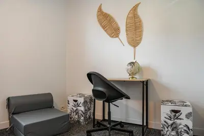 Coin salon dans l'établissement Charmante Maison à Rouen