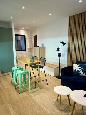 Coin salon dans l'établissement Appartement design et cozy à port cergy