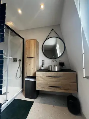 Cuisine ou kitchenette dans l'établissement Appartement design et cozy à port cergy