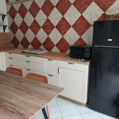Cuisine ou kitchenette dans l'établissement Terracotta