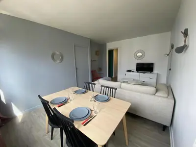 Coin salon dans l'établissement Appartement pour 8 personnes à Mont-Saint-Aignan - 217