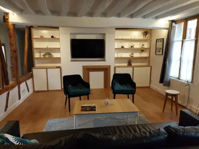 Télévision ou salle de divertissement dans l'établissement Le Relais de Lyons