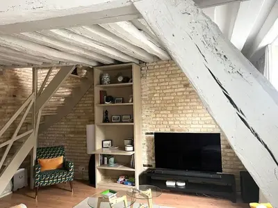 Télévision ou salle de divertissement dans l'établissement L'effet mer by HoliDieppe